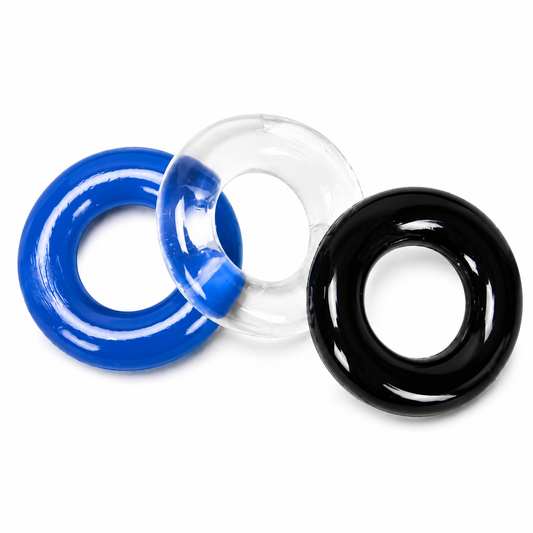 Three smooth, circular ring-shaped items overlapping on a white background: a bright blue ring on the left, a transparent clear ring in the center, and a glossy black ring on the right.