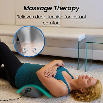Woman relaxing on the floor with the Triple Fusion back massager pillow under her lower back | ZEDSHOPPE®.